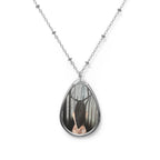 Cernunnos Mystical Forest Oval Necklace by artist Mel Fiorentino